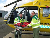 Members of the Dorset and Somerset Air Ambulance next to their essential gear. Photography: John Hoyle